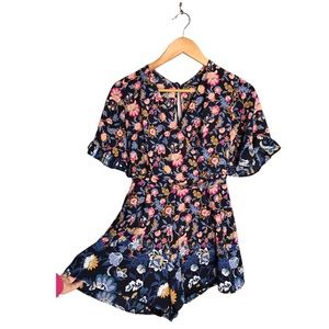 Trixxi | Blue & pink floral print ruffle trim romper keyhole back •